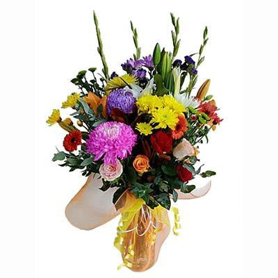 Bright colorful flower large bouquet glass cylinder vase