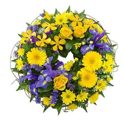 Condolences flowers funeral wreath yellow purple flowers