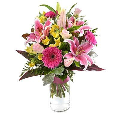 Pink flowers bouquet glass cylinder vase