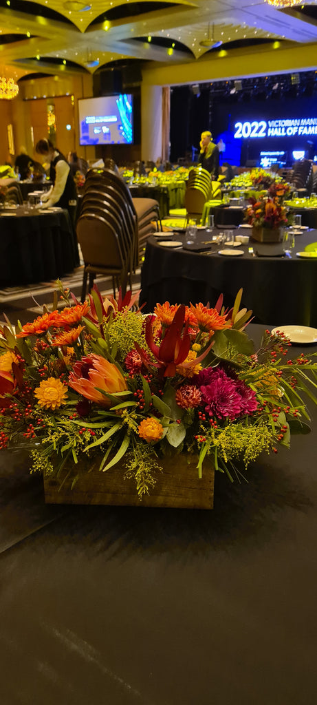 native table centrepieces for corporate event at Palladium Crown Towers