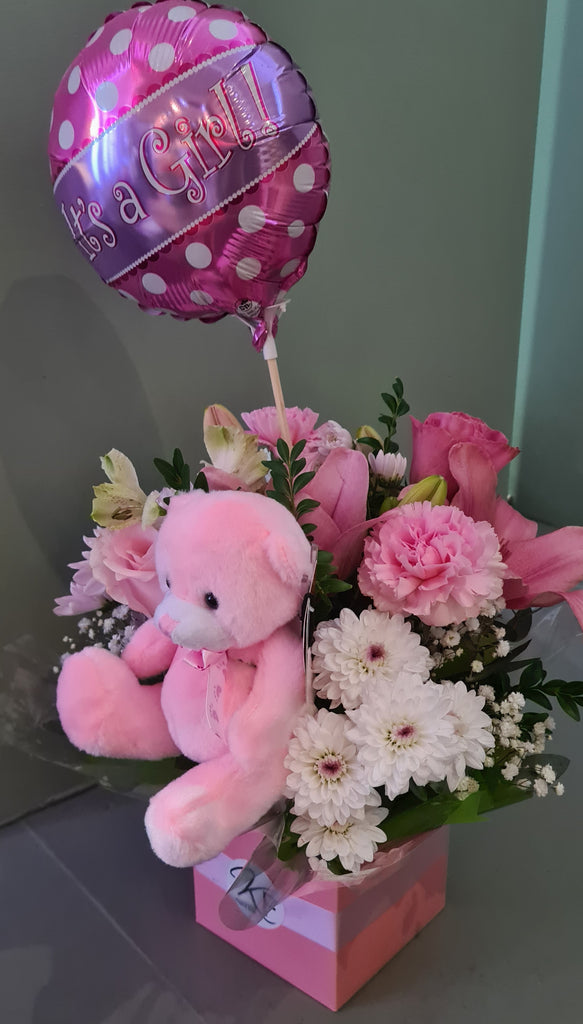 Baby girl gift package pink flowers teddy bear balloon