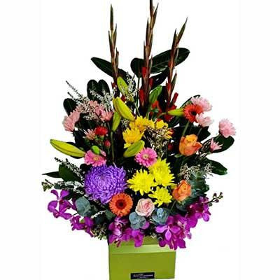 Large bright colorful flowers modern arrangement gift box