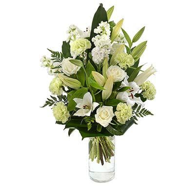 White flowers bouquet glass cylinder vase